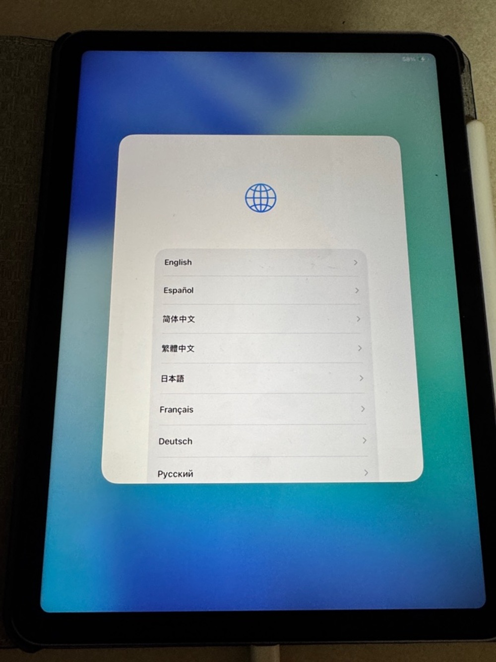 Apple iPad in purple with White Apple Pencil Attached
